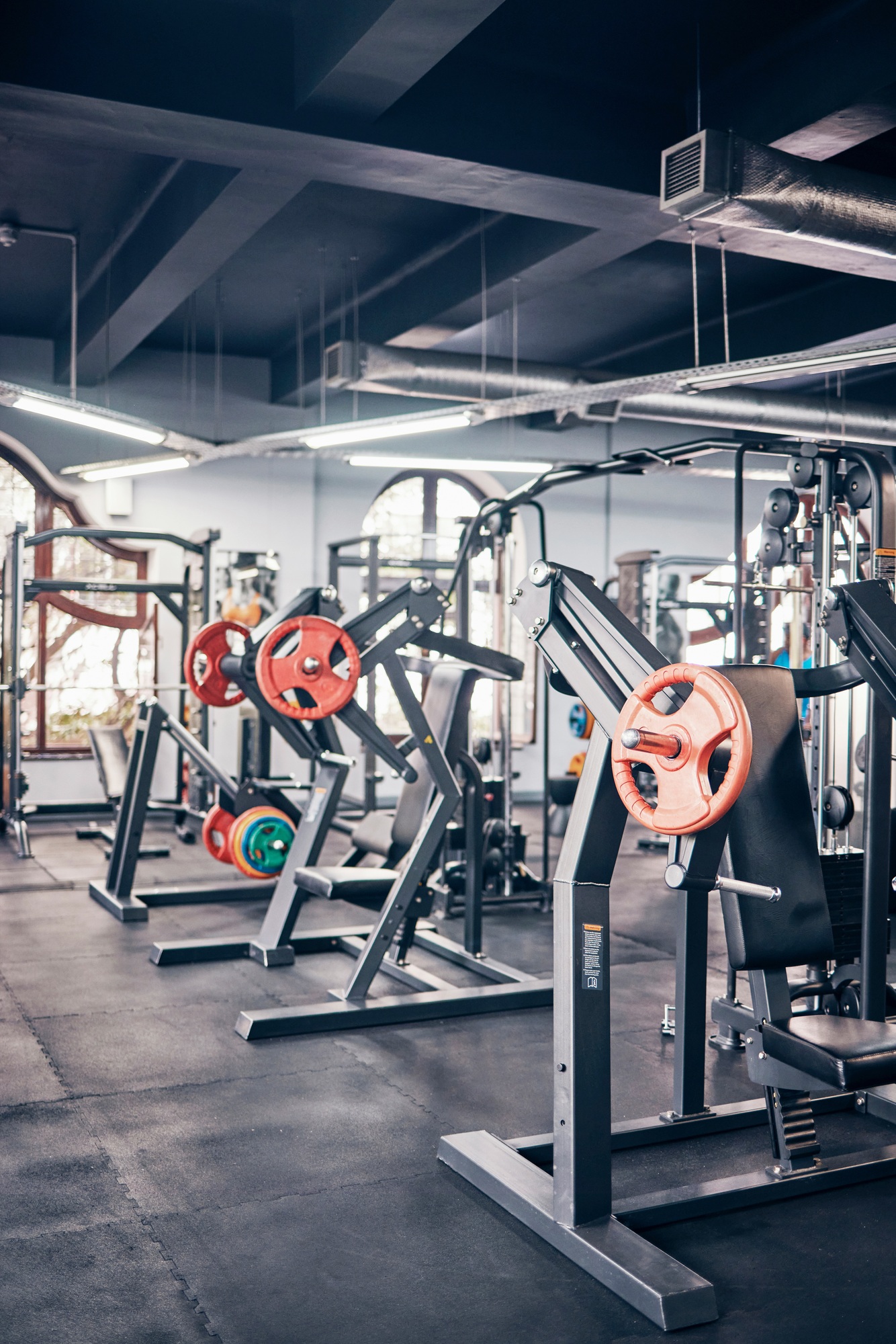 Gym, equipment and weights of fitness background for exercise, training or heavy workout for streng